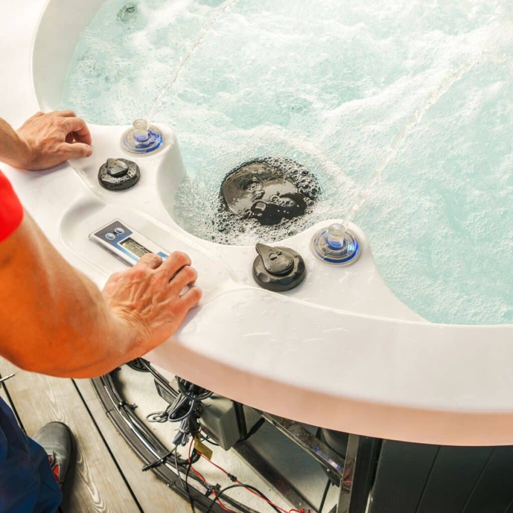 hot tub being maintained after installation