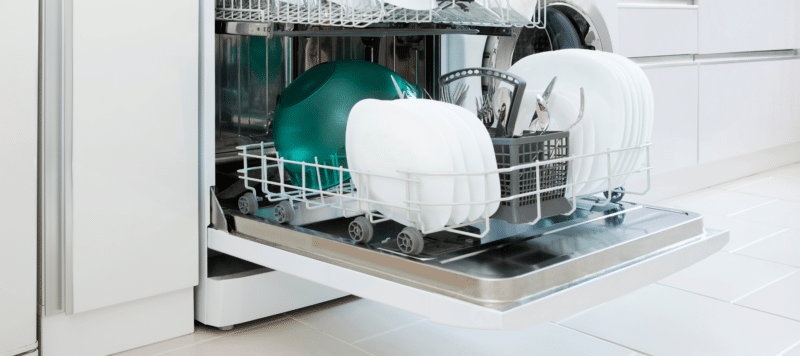 closeup of a loaded dishwasher of clean dishes